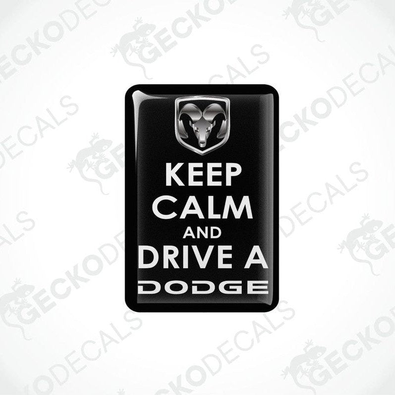  Black vinyl decals with white text saying 'KEEP CALM AND DRIVE A DODGE' and the Dodge ram logo.