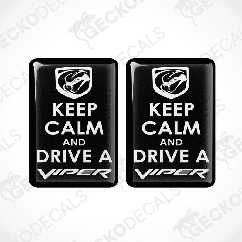 Two black vinyl stickers with the text 'KEEP CALM AND DRIVE A VIPER' and the Dodge Viper logo.