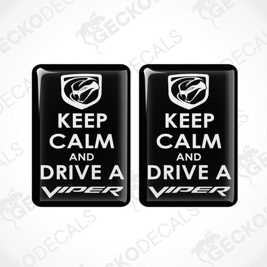 Two black vinyl stickers with the text 'KEEP CALM AND DRIVE A VIPER' and the Dodge Viper logo.