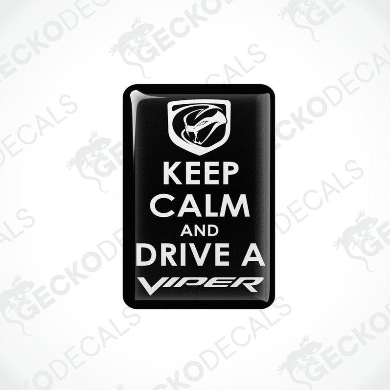 Black vinyl stickers with the text 'KEEP CALM AND DRIVE A VIPER' and the Dodge Viper logo.