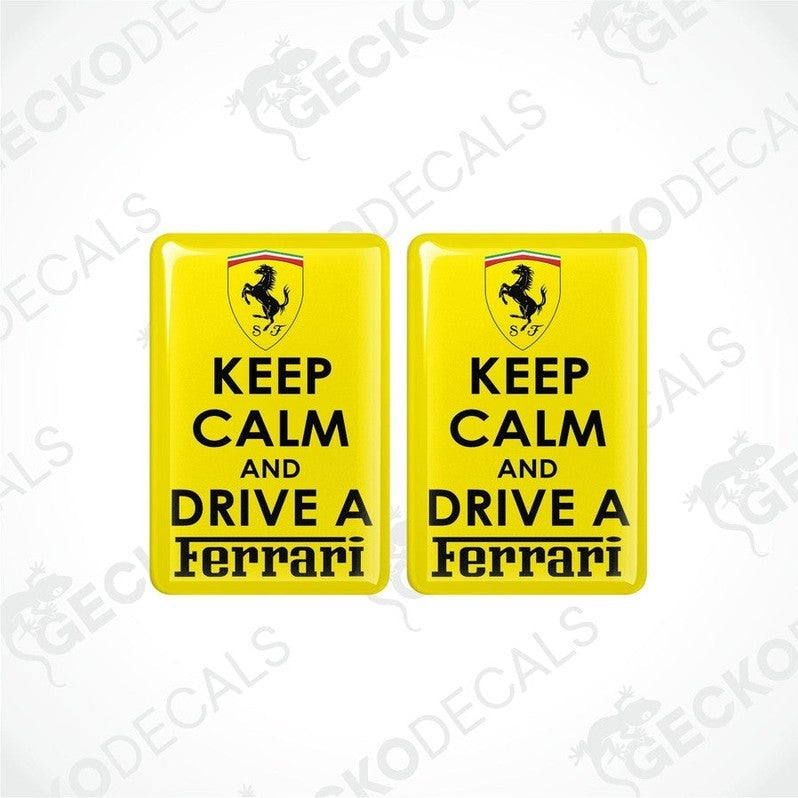 Two rectangular yellow vinyl decals with 'KEEP CALM AND DRIVE A FERRARI' text and the Ferrari logo in yellow.