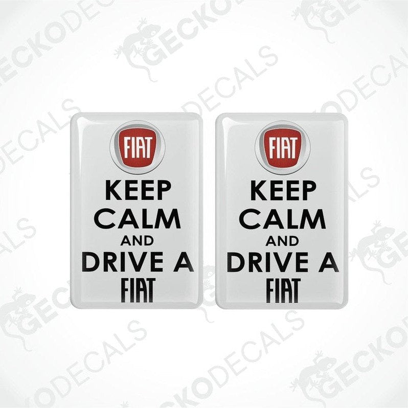 Two withe vinyl stickers with the text 'KEEP CALM' and 'DRIVE A FIAT' along with the Fiat logo.