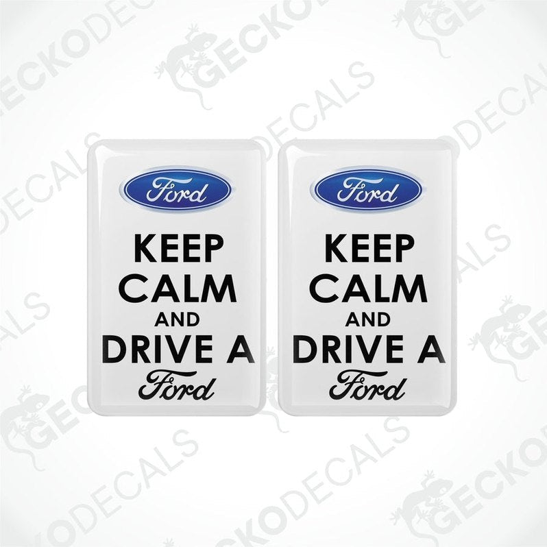 Two white vinyl stickers with the text 'KEEP CALM AND DRIVE A FORD' and the Ford logo.