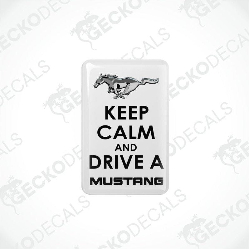  Rectangular white vehicle decals with black text and graphics, one depicting a pony and the other the phrase 'KEEP CALM AND DRIVE A MUSTANG'.