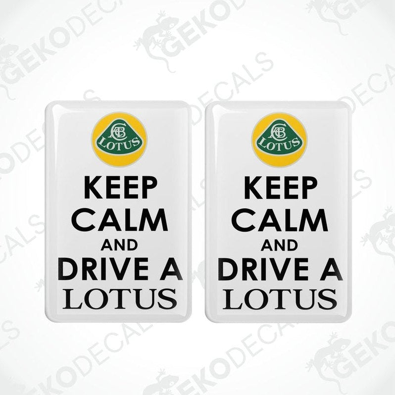 Two white vinyl stickers with a 'KEEP CALM AND DRIVE A LOTUS' text and a yellow and green geometric design.