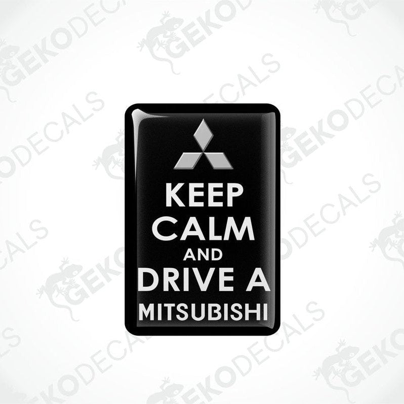  Black vinyl stickers with the text 'KEEP CALM AND DRIVE A MITSUBISHI' and a white triangle logo on each sticker.