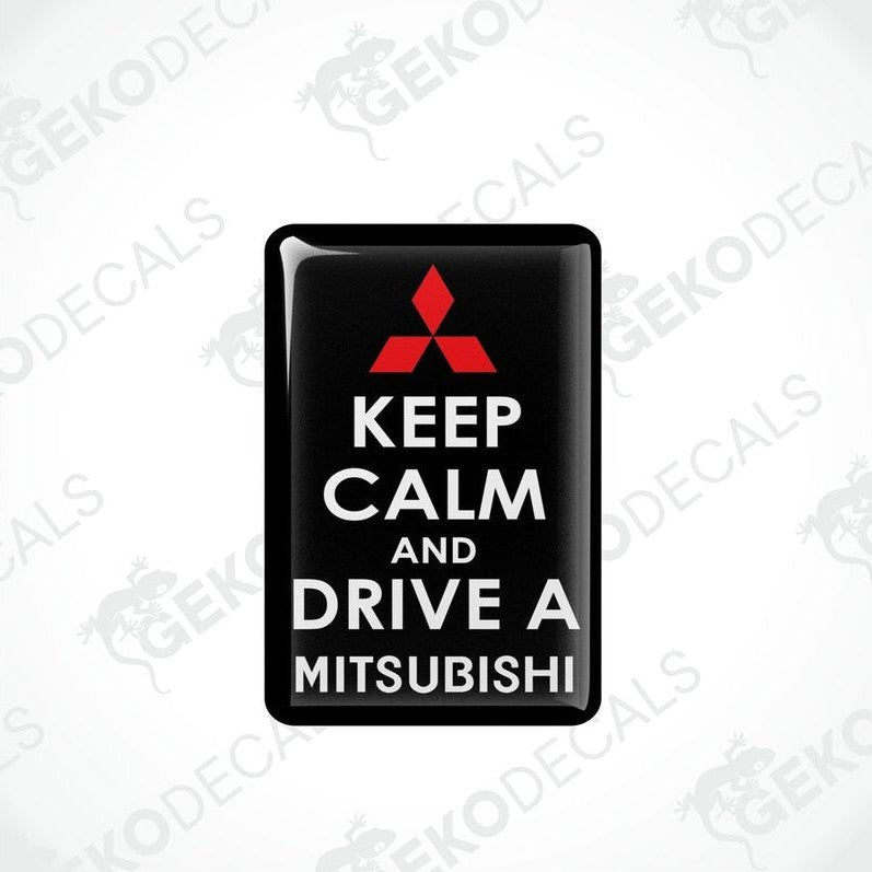  Black vinyl stickers with the text 'KEEP CALM AND DRIVE A MITSUBISHI' and a white triangle logo on each sticker.