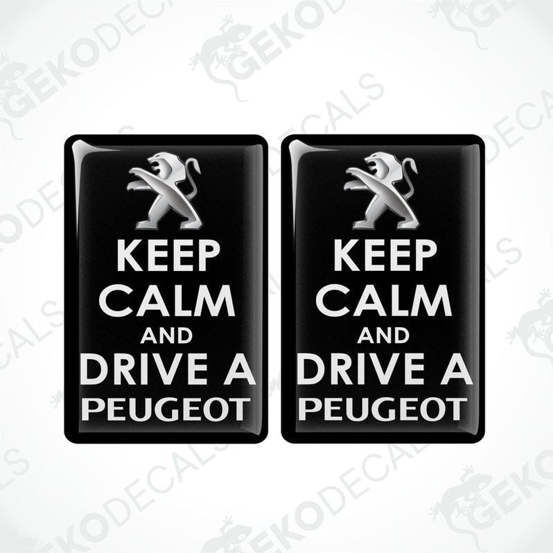 Two black vinyl stickers with the text 'KEEP CALM AND DRIVE A PEUGEOT' and the Peugeot logo.
