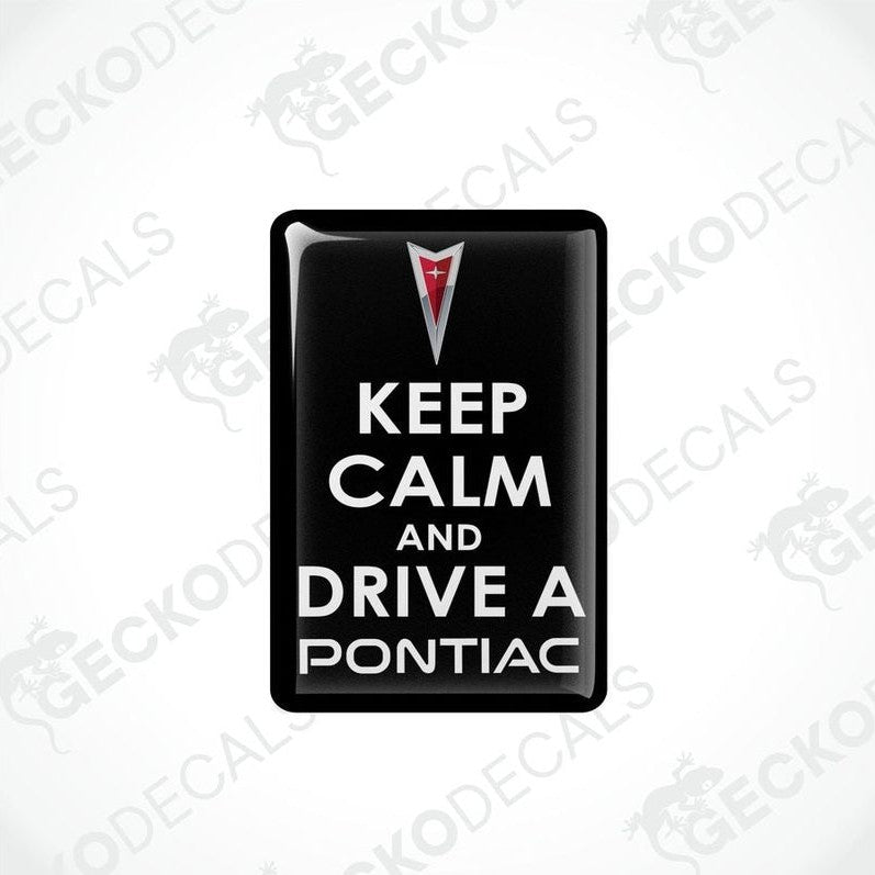 Rectangular black vinyl decals with the text 'KEEP CALM AND DRIVE A PONTIAC' and the Pontiac logo in red and white.