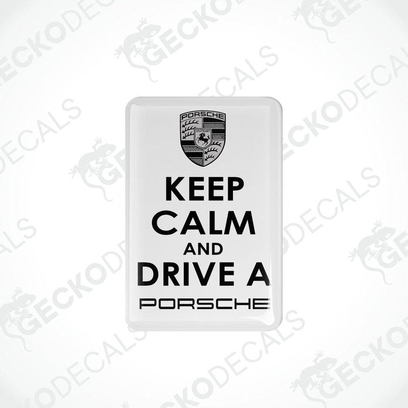Withe vinyl stickers with the text 'KEEP CALM AND DRIVE A PORSCHE' and the Porsche logo.