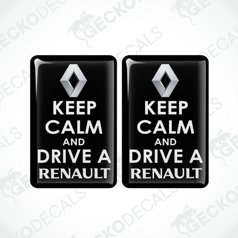 Two black vinyl stickers with the text 'KEEP CALM AND DRIVE A RENAULT' and the Renault logo.