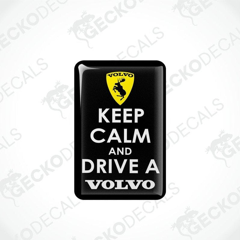 Black vinyl stickers with the text 'KEEP CALM AND DRIVE A VOLVO' and a Volvo logo on them.