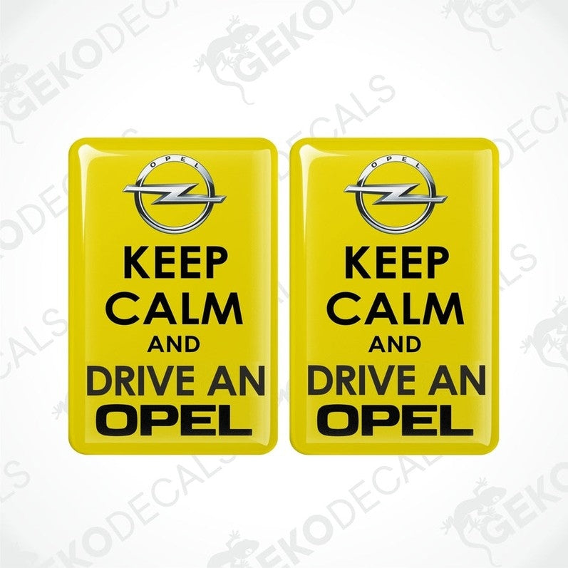 Set of two yellow domed car stickers with black KEEP CALM AND DRIVE AN OPEL text