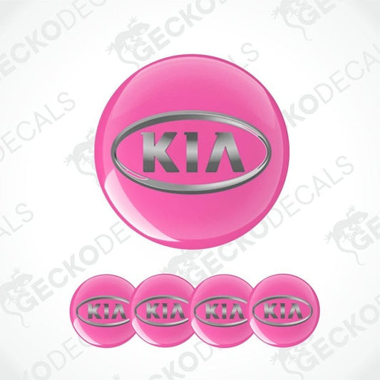 Set of pink Kia logo stickers on a white background