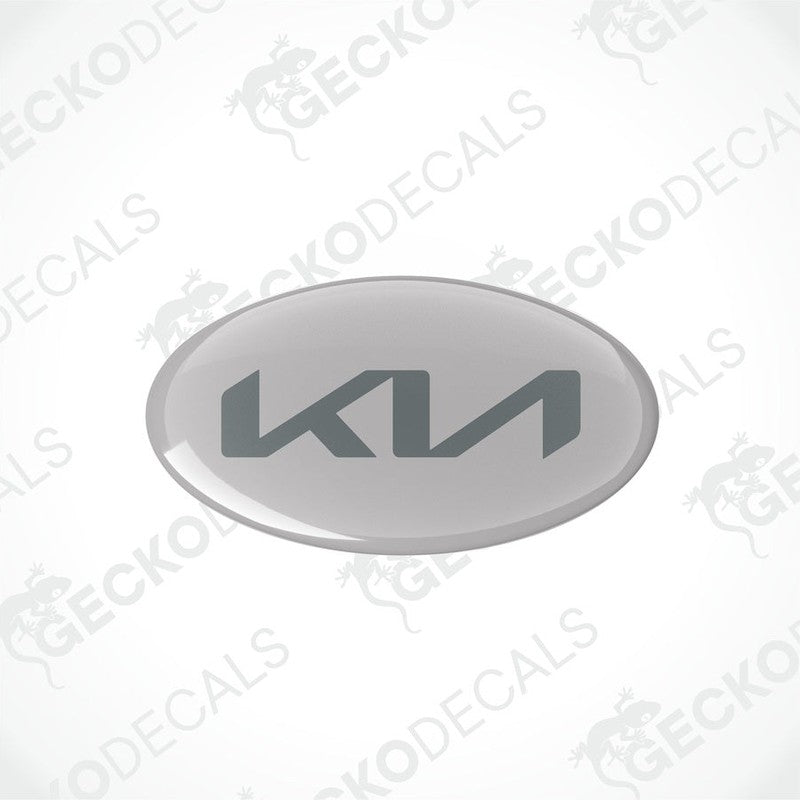 Oval vinyl stickers grey a dark grey 'KIA' logo in the center, placed against a white background with the text 'geckodecals'.