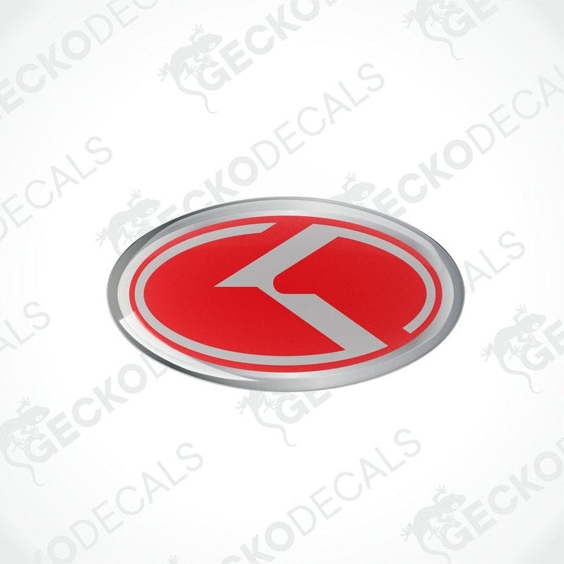 Oval vinyl stickers with a red and grey design and the letter 'KIA' in the center, placed on a white background.