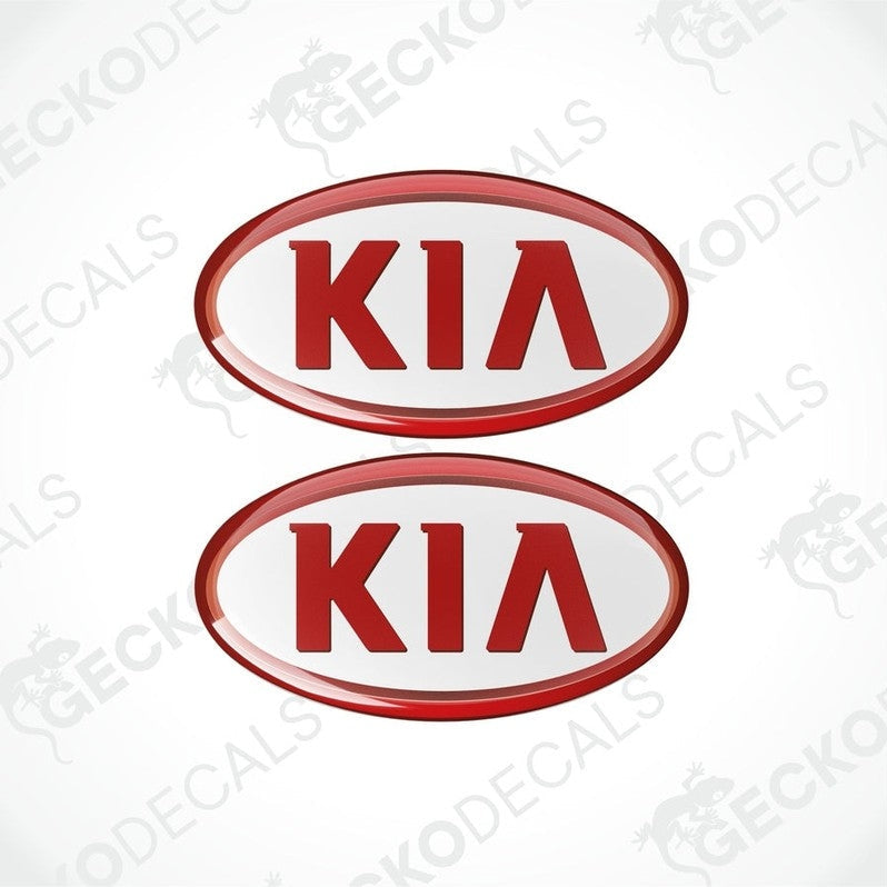 Two red and white stickers with the KIA brand logo in the center.