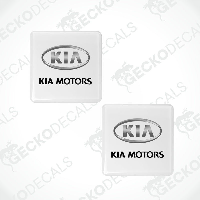 Two Kia Motors logo decals on a white background with Gecko Decals branding.