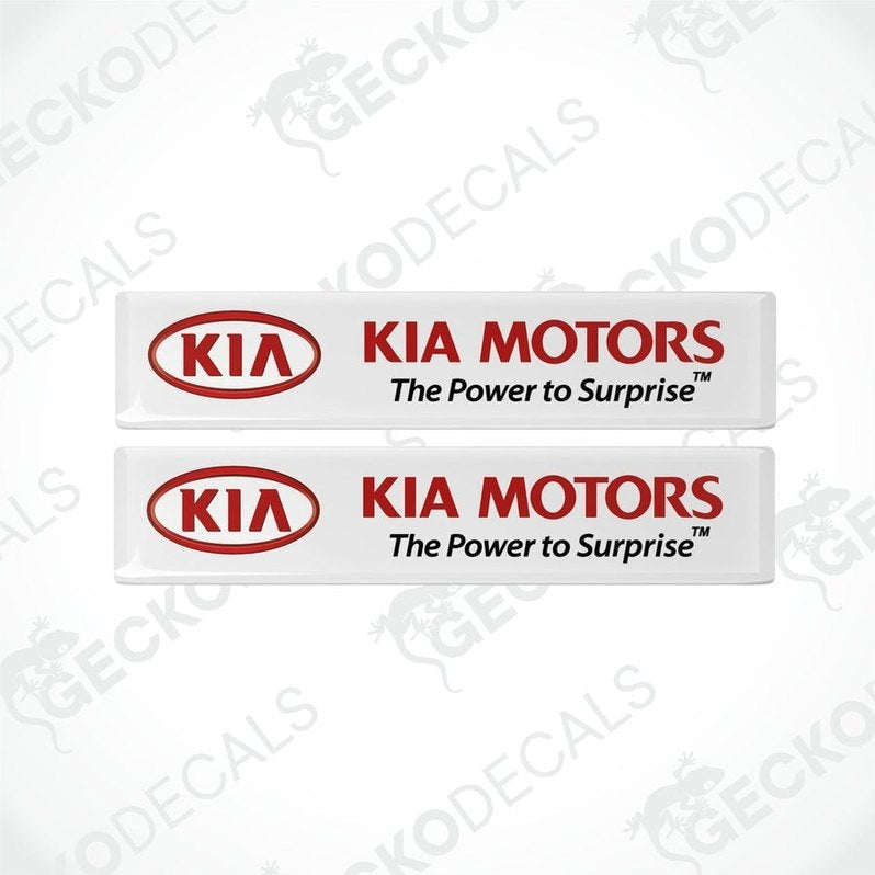 Two white vinyl stickers with the Kia Motors logo in red and white.