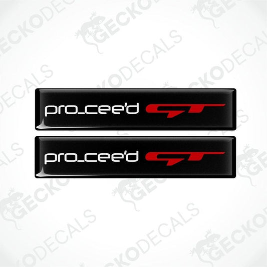 Two black vinyl stickers with the text 'PRO CEED GT' in red and white, placed against a white background.
