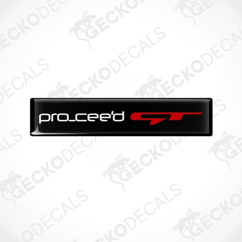 Black vinyl stickers with the text 'PRO CEED GT' in red and white, placed against a white background.