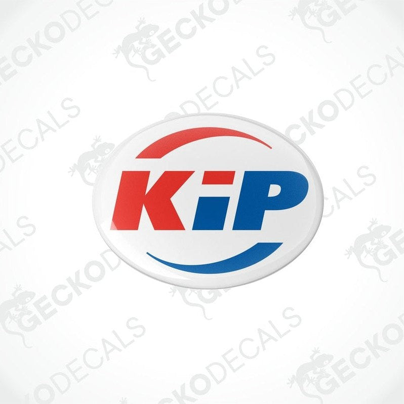 Two round decals with the letters 'KiP' in red and blue on a white background, with a logo that includes a mountain and pine tree graphic.