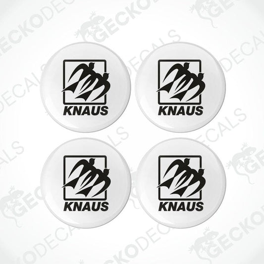 A set of four white vinyl decals with a black and red scorpion design and the brand name 'KNAUS' printed on them.