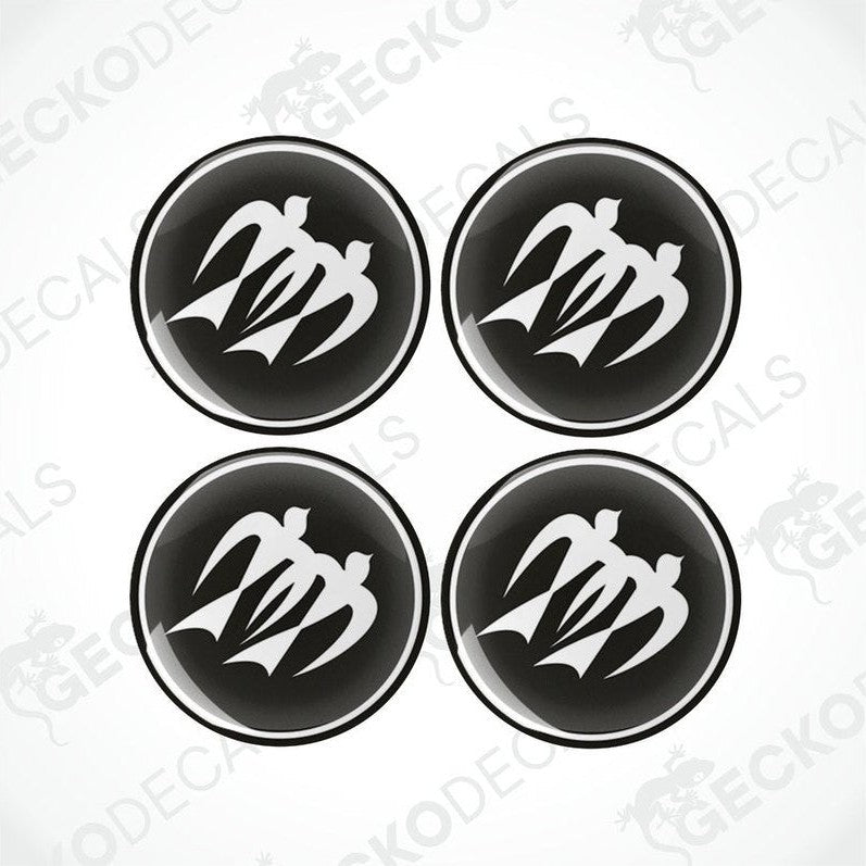 A set of four black and white vinyl decals with a polyurethane coating designed for caravans.