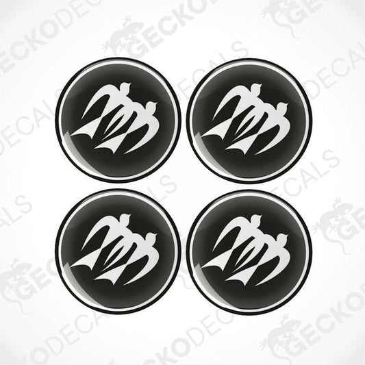 A set of four black and white vinyl decals with a polyurethane coating designed for caravans.