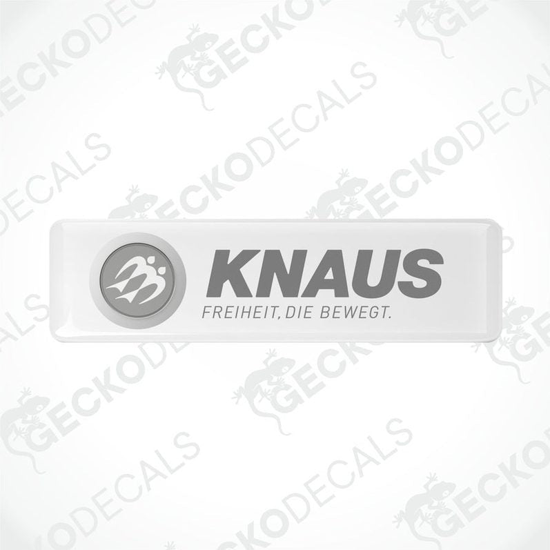 Two white rectangular epoxy decals with the text 'KNAUS FREIHEIT. DIE BEWEGT.' and the logo of KNAUS brand.