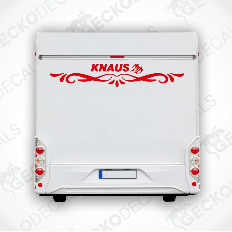 A white KNAUS decal for a caravan, featuring red and black text and decorative elements.