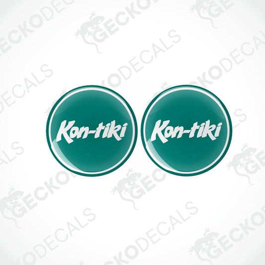 Two green round epoxy decals with the text 'Kon-tiki' on them, placed on a white background.