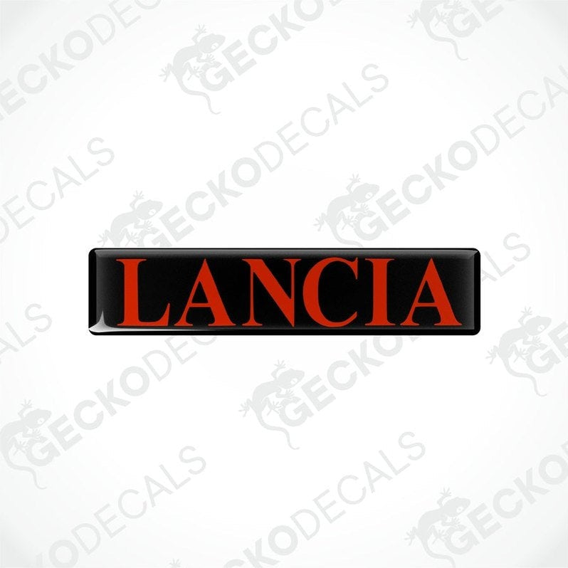  Rectangular black vinyl decals with the word 'LANCIA' written in red letters.