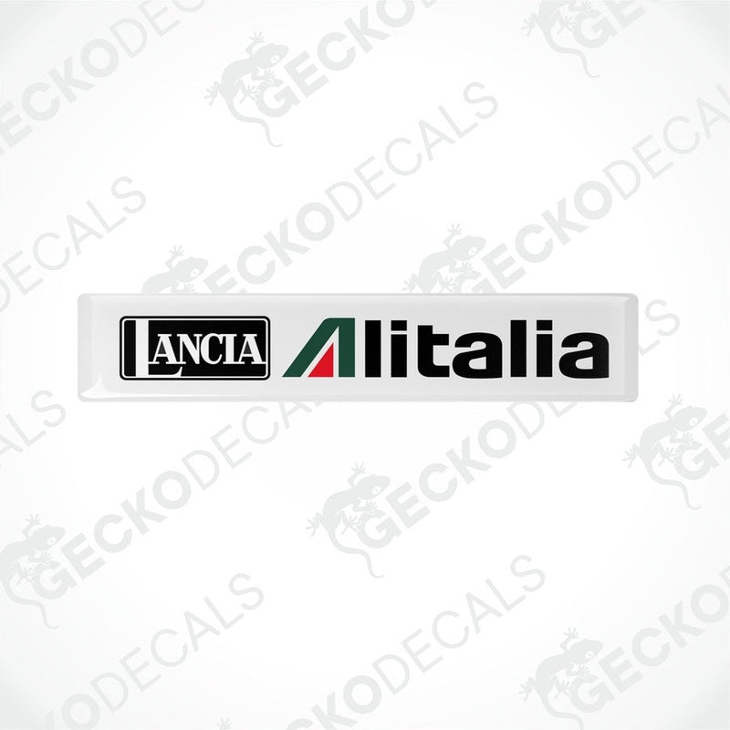  White vinyl stickers with green and red geometric patterns and the text 'LANCIA ALITALIA' printed on them.