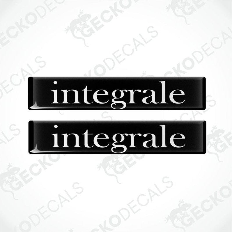 Two black vinyl decals with the word 'integrale' written in white letters.