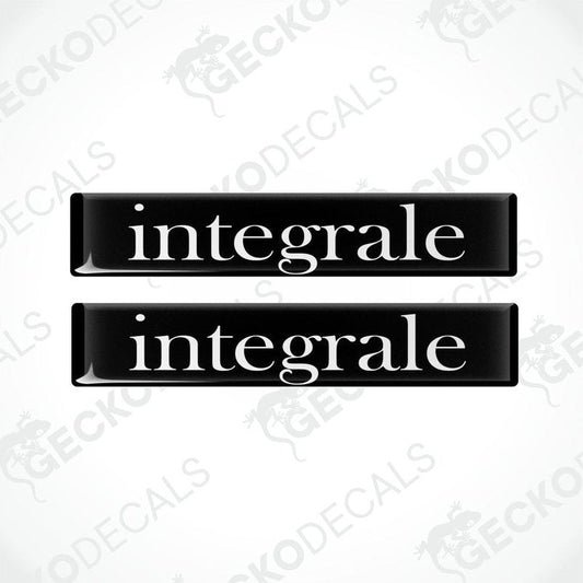 Two black vinyl decals with the word 'integrale' written in white letters.