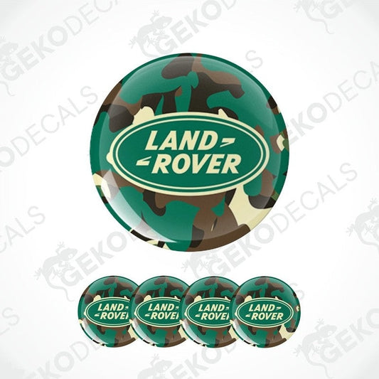 A set of four round car decals with a camouflage pattern and the Land Rover logo in the center.