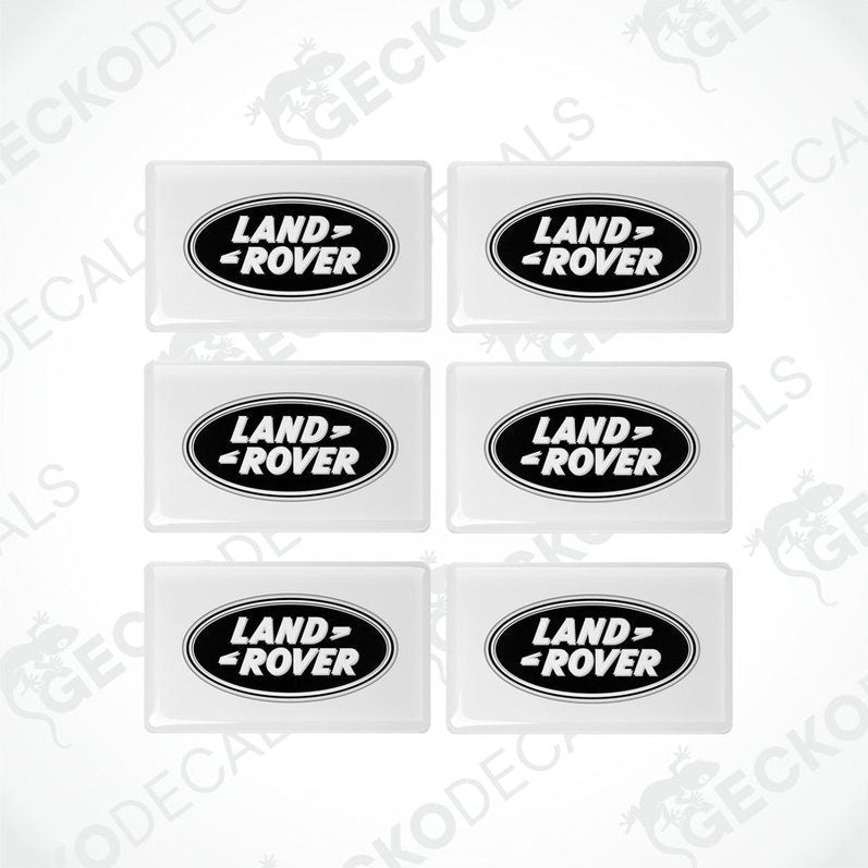 Set of six white and black vinyl decals with the Land Rover logo.
