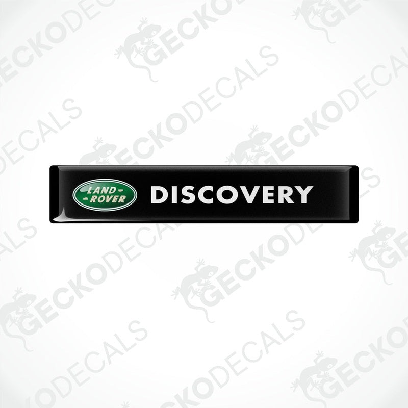 Black vinyl decals with the text 'DISCOVERY' and the Land Rover logo in green and white.