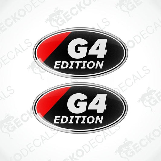 Two oval-shaped vinyl decals with 'G4 EDITION' text, predominantly red with black and white accents, on a white background.