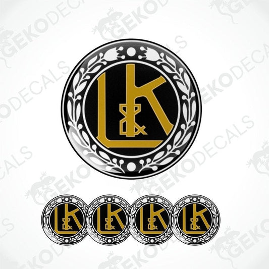 A set of four circular vinyl decals with a polyurethane coating featuring the LAURIN & KLEMENT logo in black, gold, and white colors.