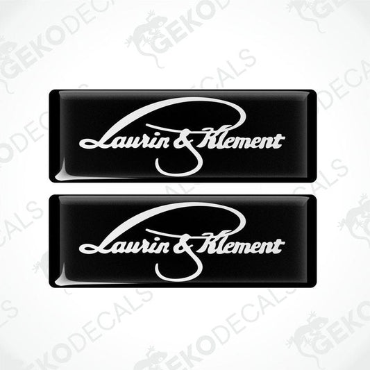 Two rectangular black vehicle decals with white text reading 'Laurin & Klement'.