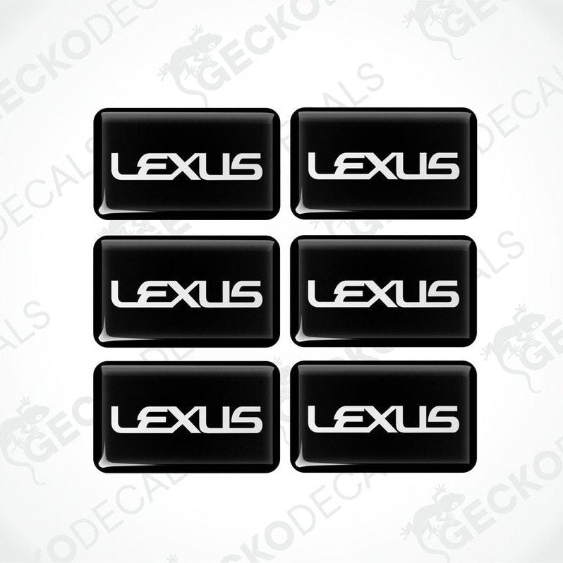 A set of six black vinyl stickers with the LEXUS brand logo.