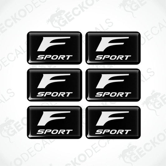 A set of six black vinyl stickers with the Lexus F Sport logo printed on them.