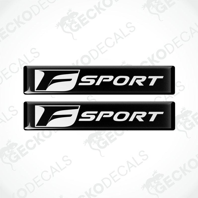 Two black vinyl stickers with the Lexus F Sport logo on a white background.