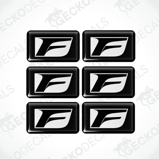 A set of six black vinyl stickers with the Lexus F Sport logo printed on them.