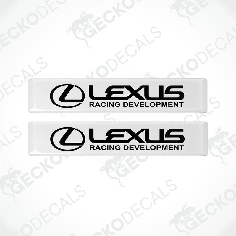 Two white vinyl stickers with the Lexus Racing Development logo in black.