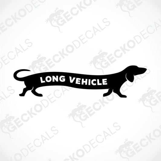 A die cut decal in the shape of a long dog with the text 'LONG VEHICLE' on it, primarily black in color.