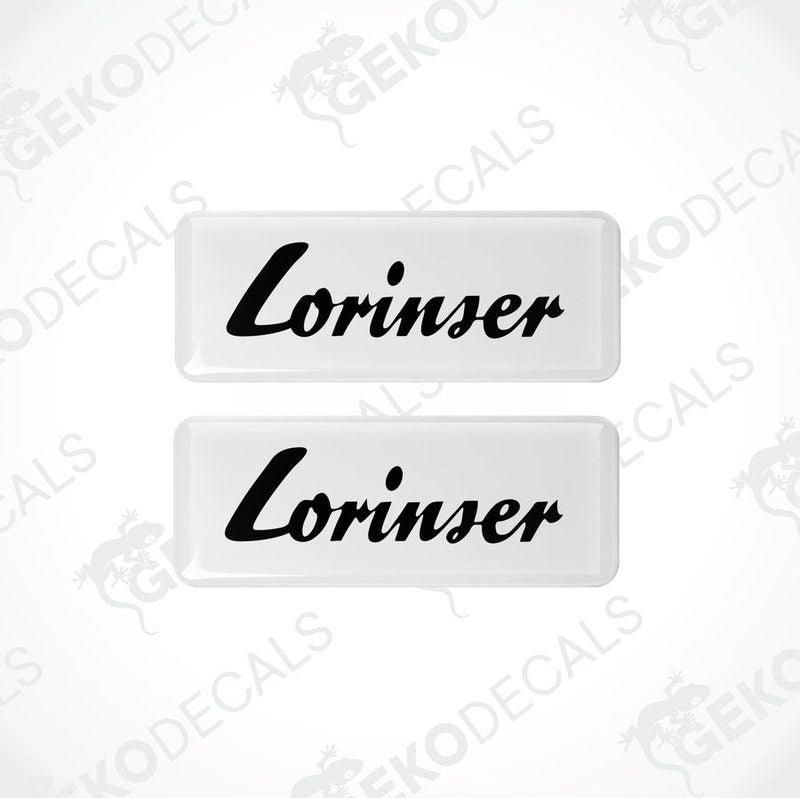 Two white and black rectangular car decals with the text 'Lorinser' on them.