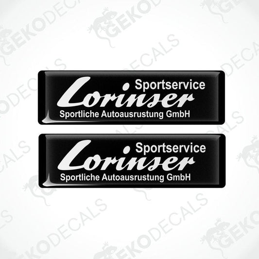 Two black vinyl decals with white text that read 'Lorinser Sportservice Sportliche Autoausrustung GmbH'.